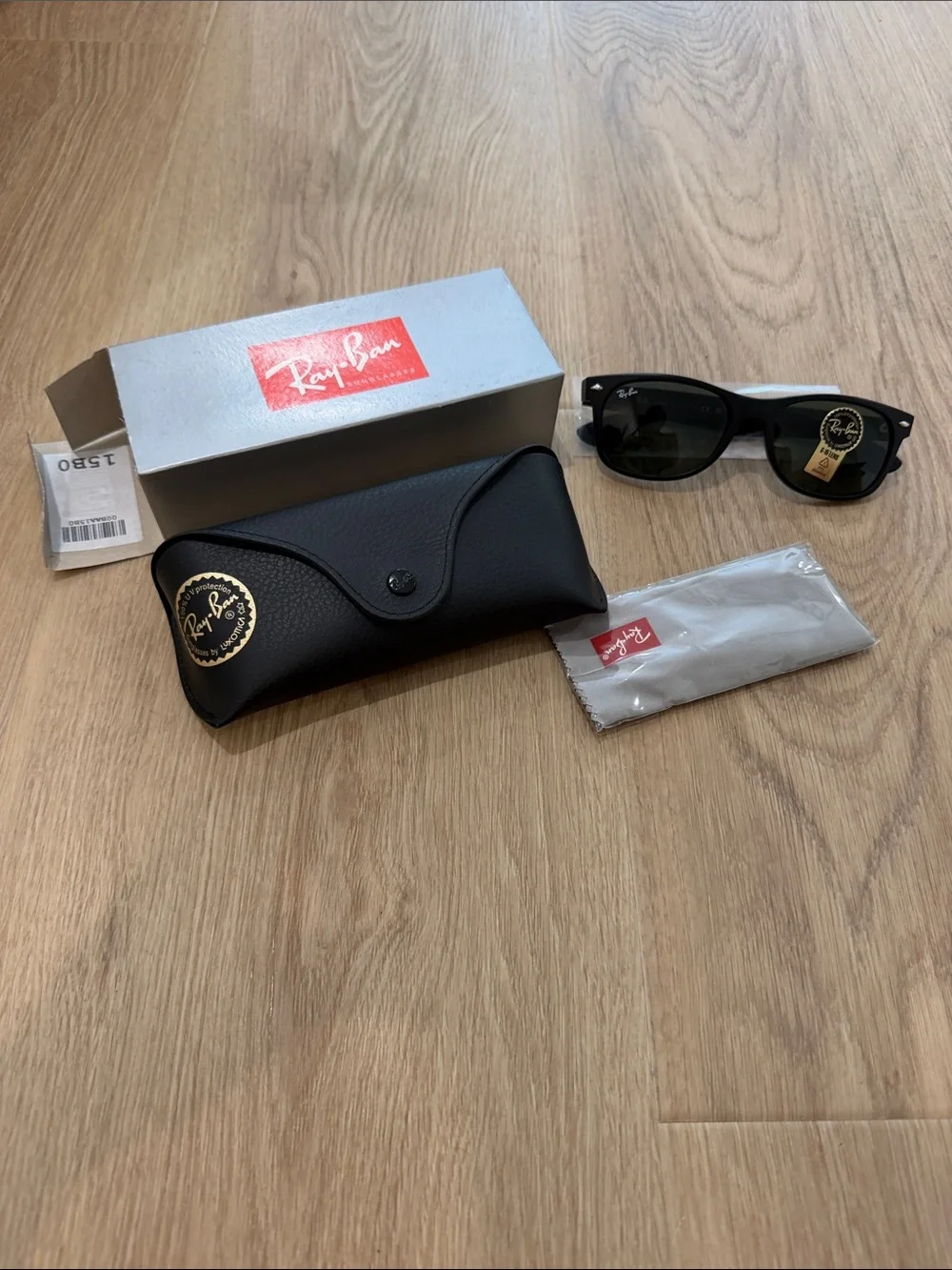 Ray-Ban Black Wayfarer Sunglasses with Dark Lenses